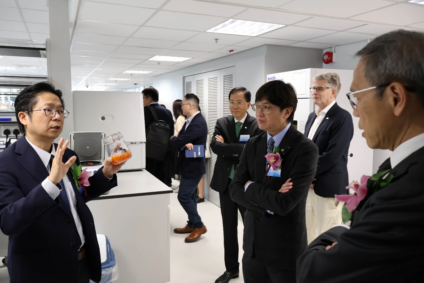 Guests tour the HKJCGHI global headquarters and laboratory.