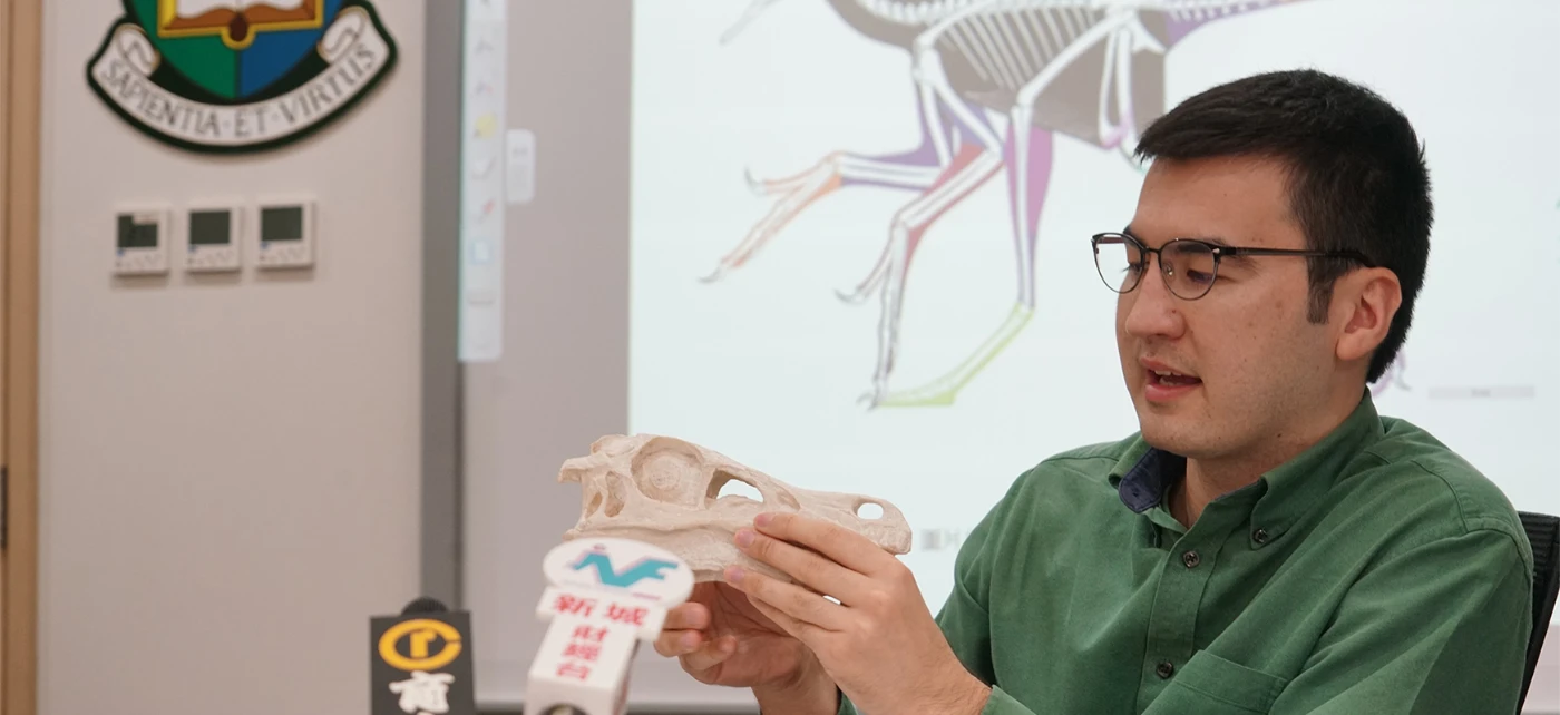 Dr. Pittman talking about his work on avian and flight origins in an earlier media event. Credit: Faculty of Science, HKU.