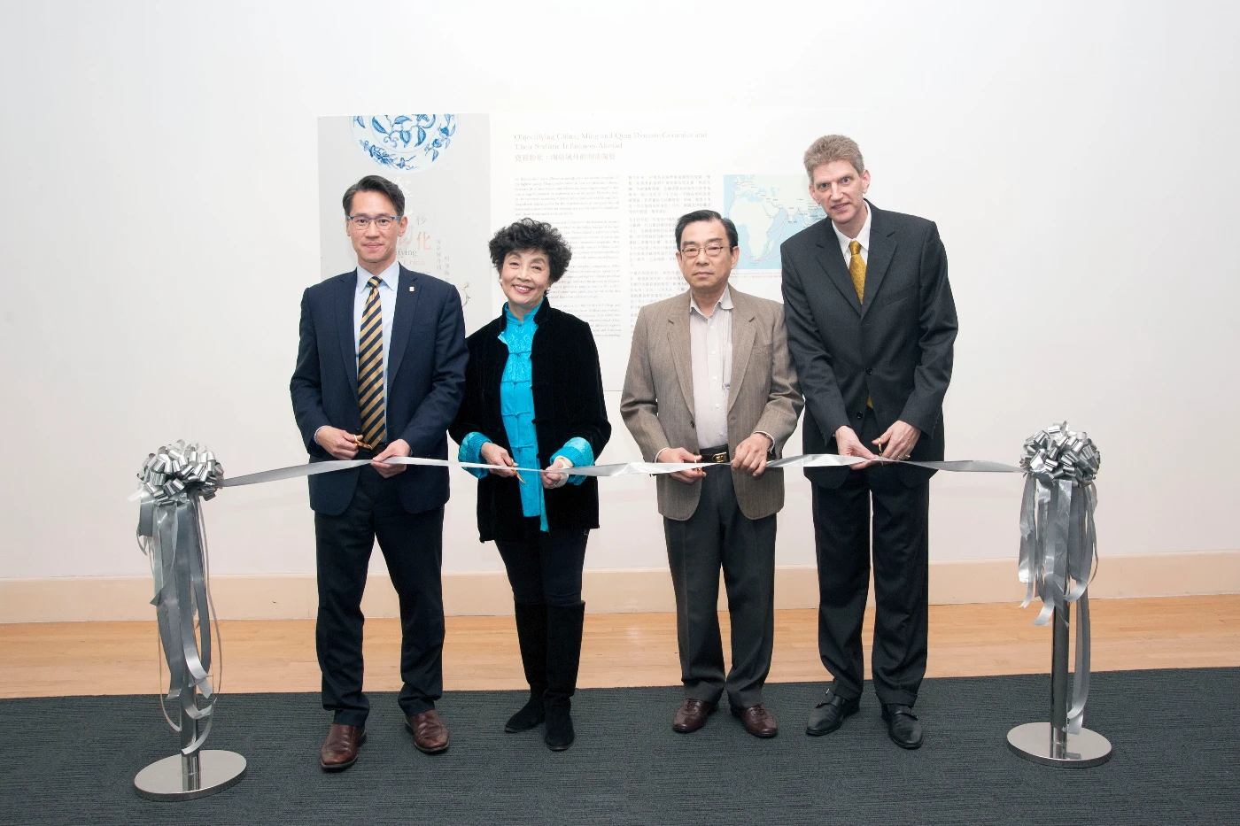 (From left) Ribbon-cutting ceremony by Vice-President and Pro-Vice-Chancellor (Global) of HKU Professor W. John Kao, Chairman of the Robert Black College Management Committee of HKU Mrs Annie Bentley, Assistant Professor of School of Economics and Finance, Faculty of Business and Economics of HKU Dr Chen Cheng and UMAG Director Dr Florian Knothe.