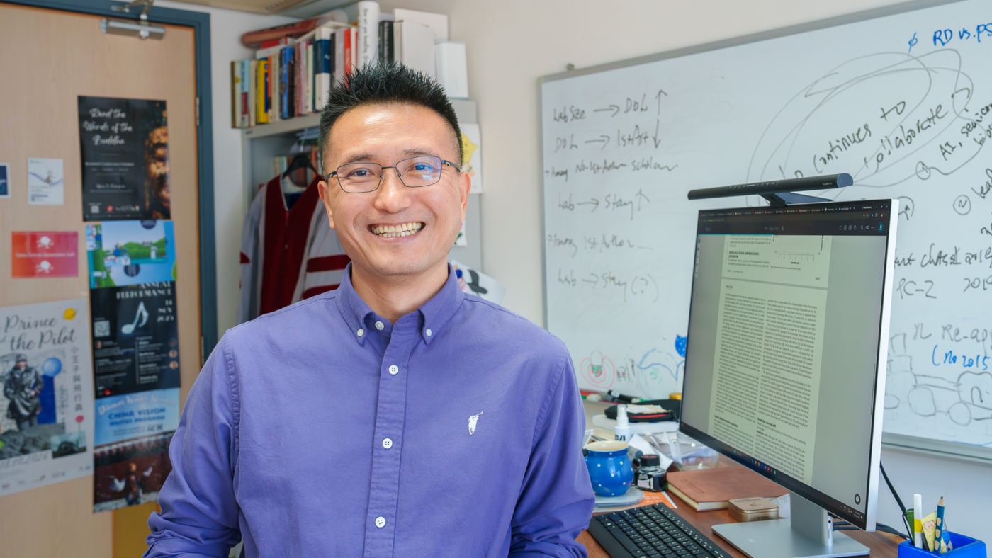 Professor Yanbo Wang in his office at the HKU Business School.