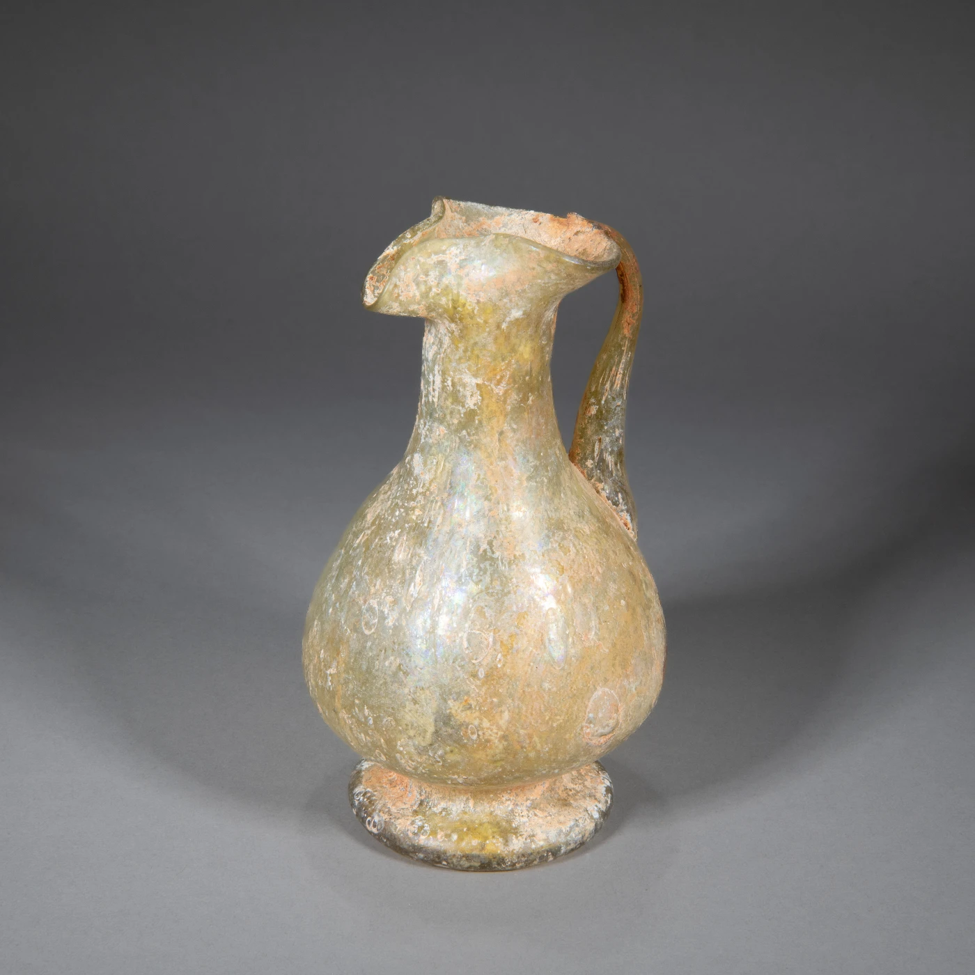 Ewer
Blown, tooled and applied glass
Islamic Persia (7th–8th century CE)
or China (Tang dynasty (618–906)
or Liao dynasty (907–1125))
Private Collection