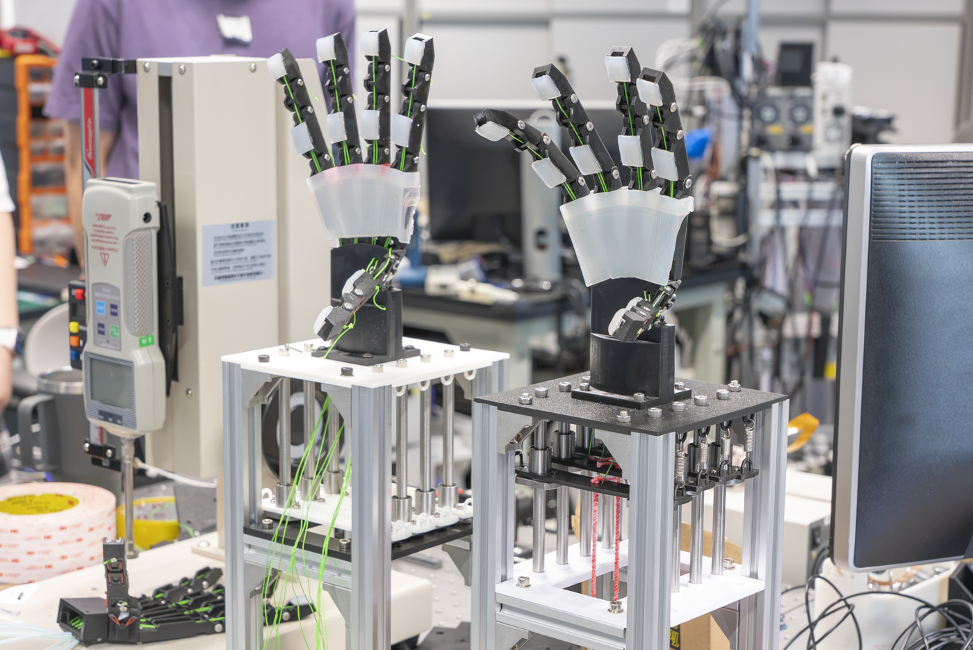 Prosthetic hands on display in Professor Xi's lab.