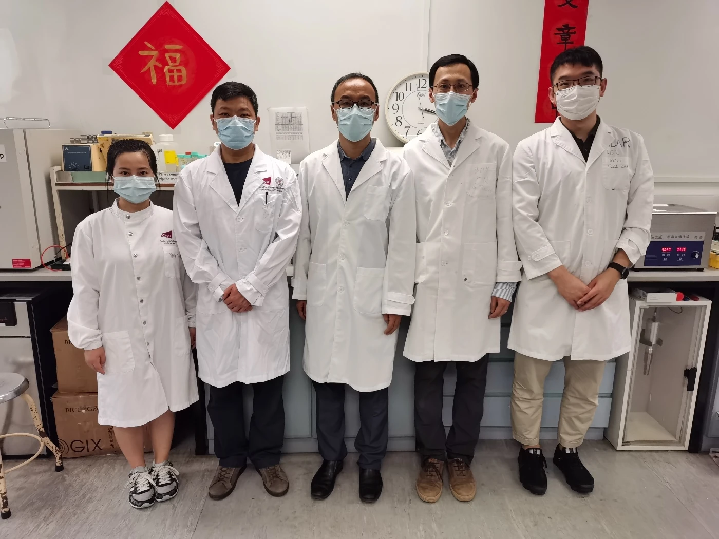 From the left: Ms Xuemei YANG (CityU), Professor Sheng CHEN (CityU), Professor Xuechen LI (HKU), Dr  Han Liu (HKU) and Mr Tongyao WEI(HKU).