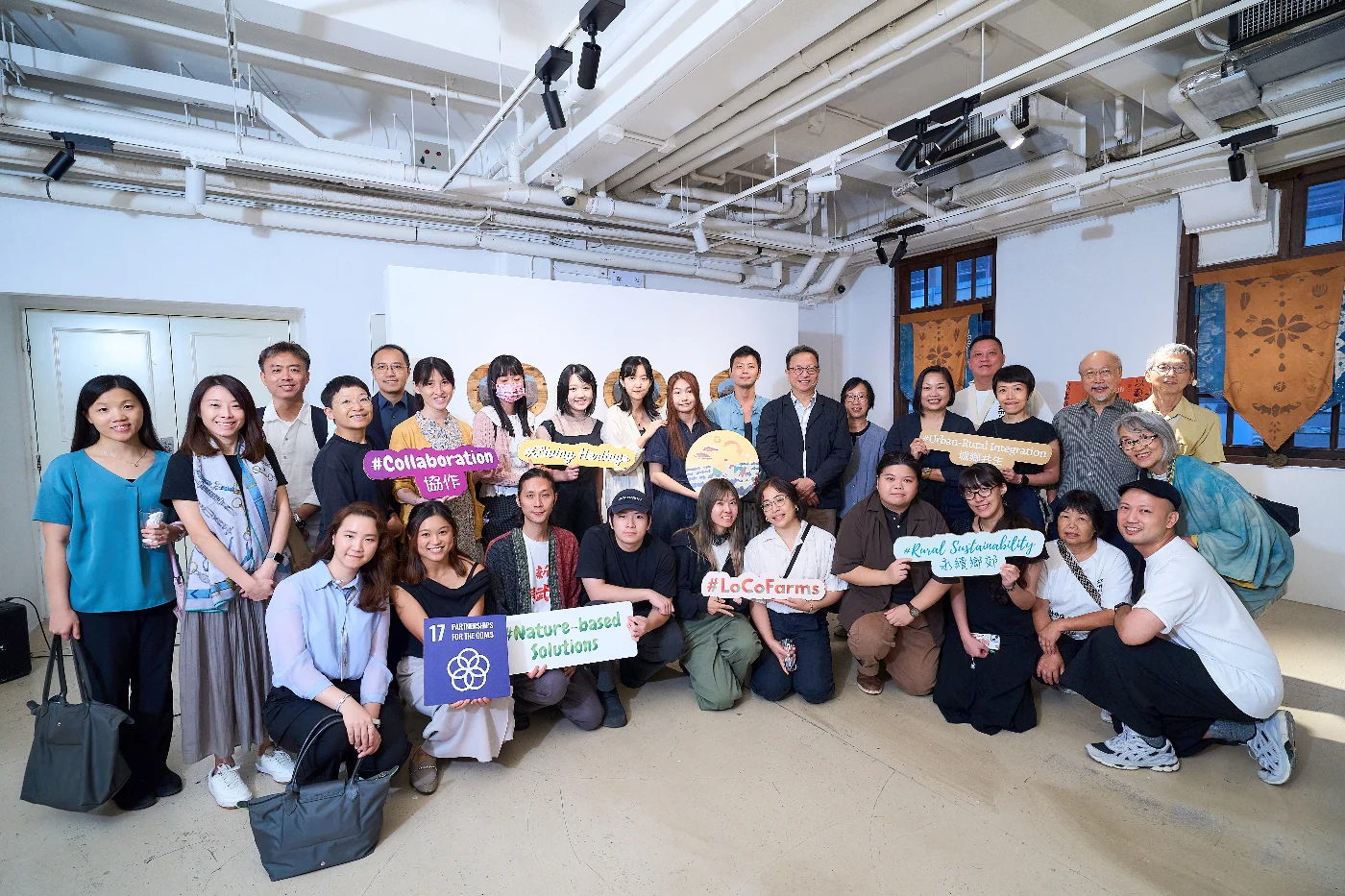 The HKU Centre for Civil Society and Governance team, artist mentors, and Lai Chi Wo village representatives marked the opening of the "Celebrating Traditional Wisdom through Art" Exhibition at the Fringe Club.
