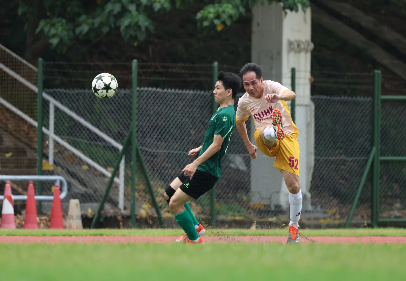 Players from both teams compete hard during the game.