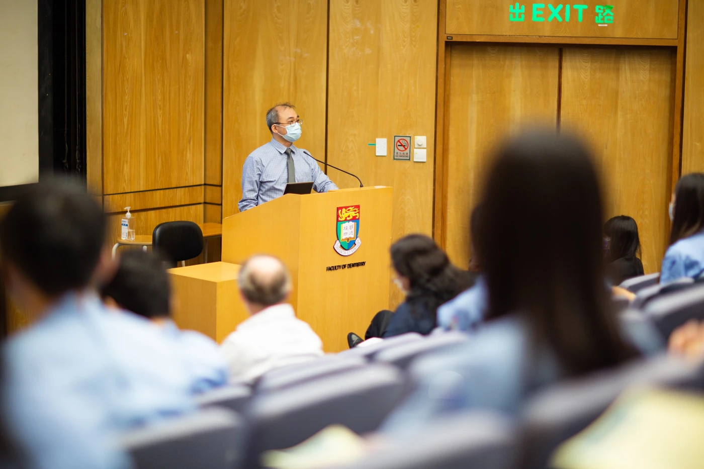 Professor G.S.P. Cheung, Associate Dean (Undergraduate Education) introduces the Guest of Honour, Mr Huen Wong, BBS, JP, Chairman, Board of Governors, The Prince Philip Dental Hospital