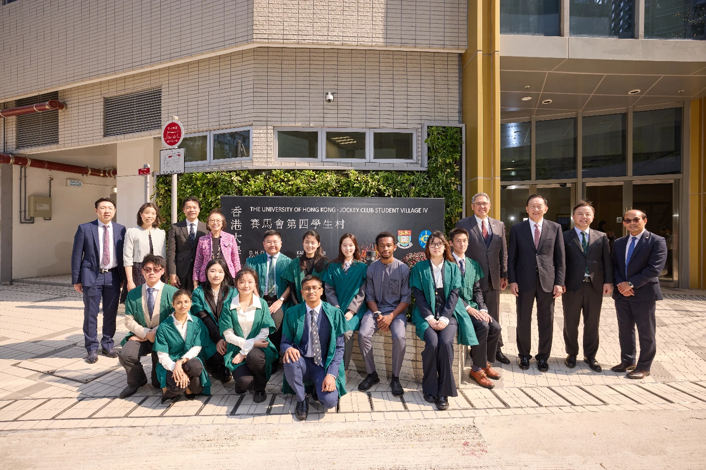 (From left) Masters of Colleges: Professor Ivan Hung, Professor Pamela Lee, Professor Kaimin Shih, Professor Sophia Chan, Steward of The Hong Kong Jockey Club Mr Lester Huang, HKU Council Chairman Dr Peter Wong, President & Vice-Chancellor Professor Xiang Zhang, Dean of Student Affairs Professor Samson Tse, and student hosts at the Jockey Club Student Village IV.