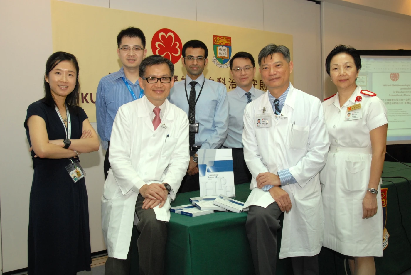Professor Kwong Yok-lam (second from the left, front row), Professor James Chim Chor-sang (second from the right, front row), Dr Eric Tse Wai-choi (first from the right, back row) and the Haematology Team of the Department of Medicine at HKU and QMH, established the Heamatology Protocol.