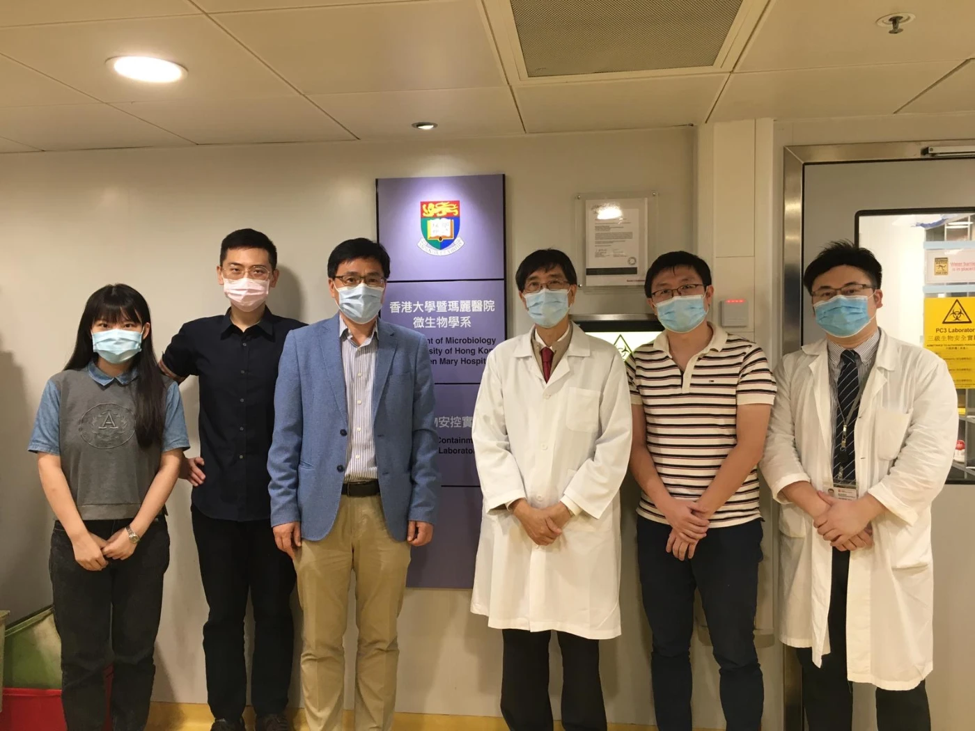 The research team (from the right) Miss Suyu WANG, Dr Runming WANG, Professor Hongzhe SUN, Professor Kwok-Yung YUEN, Dr Shuofeng YUAN and Dr Jasper F W CHAN