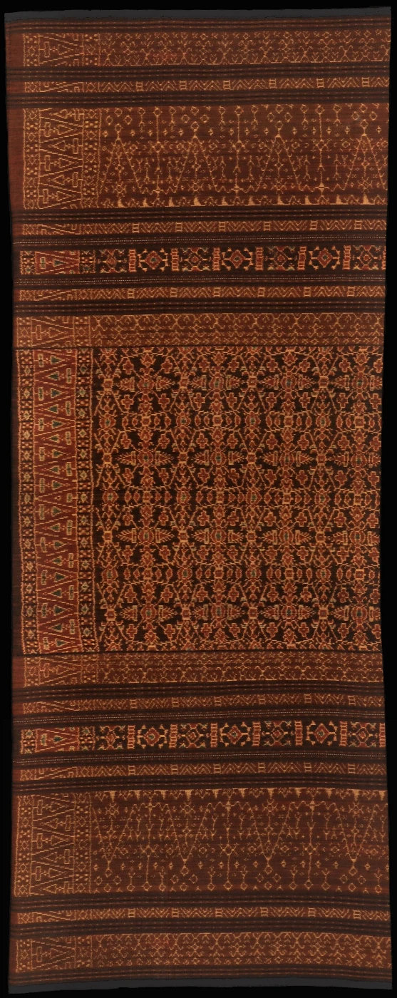 Flores (Lio)
     Nggela people
     Lawo, sarong
     Warp ikat in fine hand-spun cotton
     1920–1930 (Image 99)