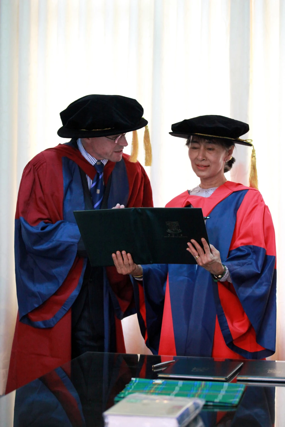 Professor Ian Holliday Holliday, Burma expert and Professor in Department of Politics and Public Administration, presents the Honorary Professorship Certificate to Daw Aung San Suu Kyi
